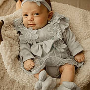 Lyloo participe au concours pour gagner de l'argent avec cette photo : baby, basket, blanket, child, cozy, cute, decor, dress, flower, footwear, headband, indoors, infant, lace, portrait, resting, smile, socks, soft_texture, warm_tones