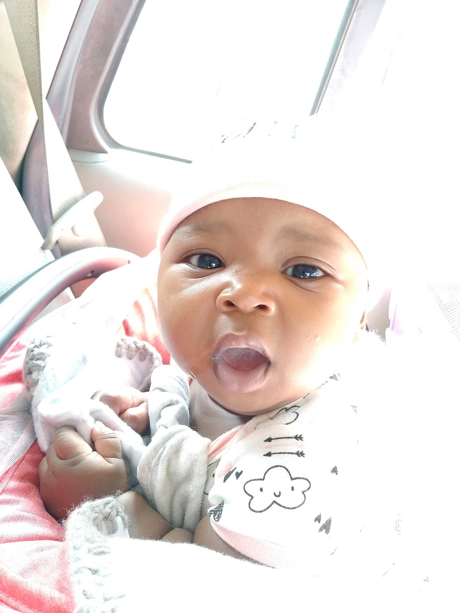 Ja'Leigha is registered to the contest to win money with this photo: baby, birth, cheek, child, eye, face, forehead, head, headwear, lip, mouth, nose, person, photography, pink, skin, smile, toddler