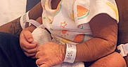 Nykajiah joined the competition — help win amazing prizes! baby, newborn, infant, sleeping, pink_bow, hospital, hospital_wristband, arm, hand, tattoo, blanket, cute, closeup, person, love, heart_emoji, resting, soft_lighting, cozy, parent