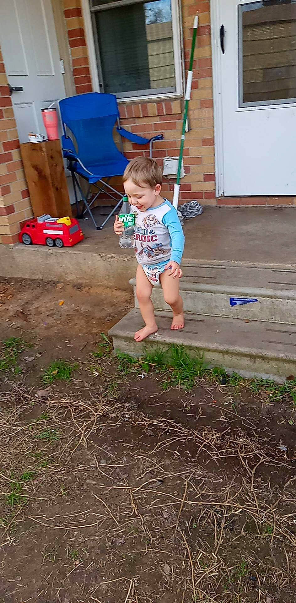 Dennis joined the competition — help win amazing prizes! backyard, chair, child, door, flooring, fun, garden, gardening, grass, landscape, landscaping, leisure, people_in_nature, person, shorts, sitting, soil, t_shirt, toddler, wood