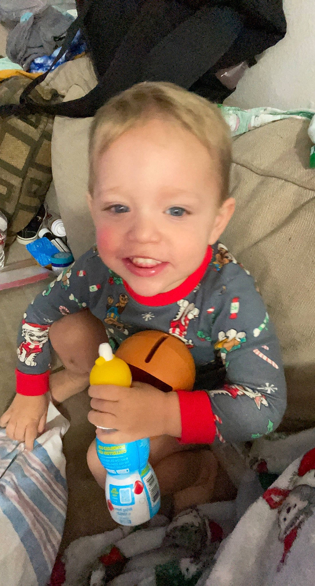 Dennis joined the competition — help win amazing prizes! baby, baby_playing_with_toys, baby_products, baby_toddler_clothing, bottle, cheek, child, drinkware, finger, fun, hand, happy, human_leg, nail, person, plastic_bottle, sitting, skin, smile, thumb