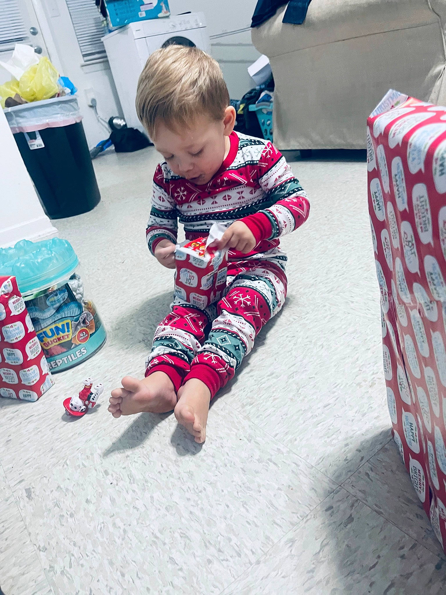 Dennis joined the competition — help win amazing prizes! baby, baby_toddler_clothing, carmine, carpet, child, flooring, foot, fun, holiday, human_leg, lap, pajamas, pattern, person, play, sitting, sleeve, sock, t_shirt, toddler