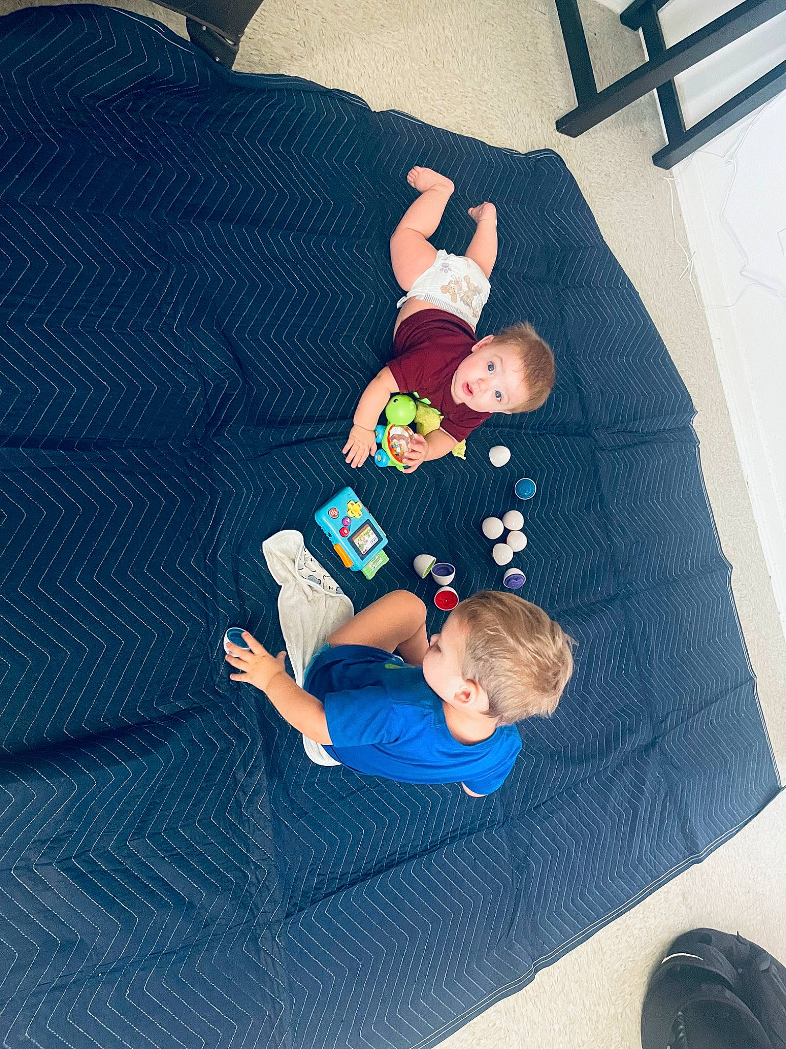 Liam joined the competition — help win amazing prizes! baby, baby_products, baby_sleeping, baby_toddler_clothing, baby_toys, child, comfort, electric_blue, fun, lap, leisure, linens, pattern, person, play, room, sitting, sock, surprise, t_shirt