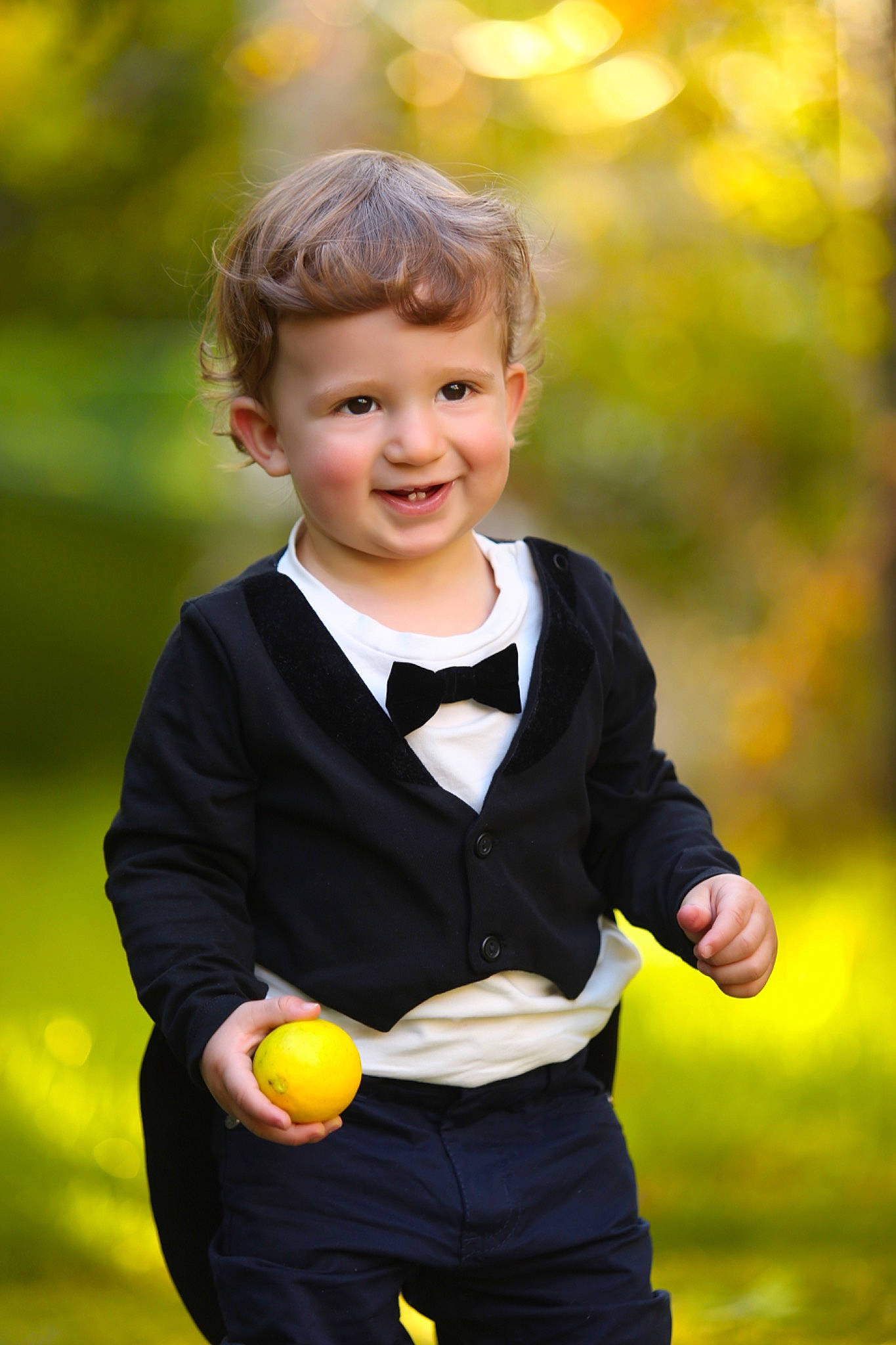 Andre joined the competition — help win amazing prizes! baby, baby_toddler_clothing, ball, child, child_model, finger, fruit, hand, happy, joy, people_in_nature, person, photo_shoot, play, portrait, portrait_photography, standing, toddler