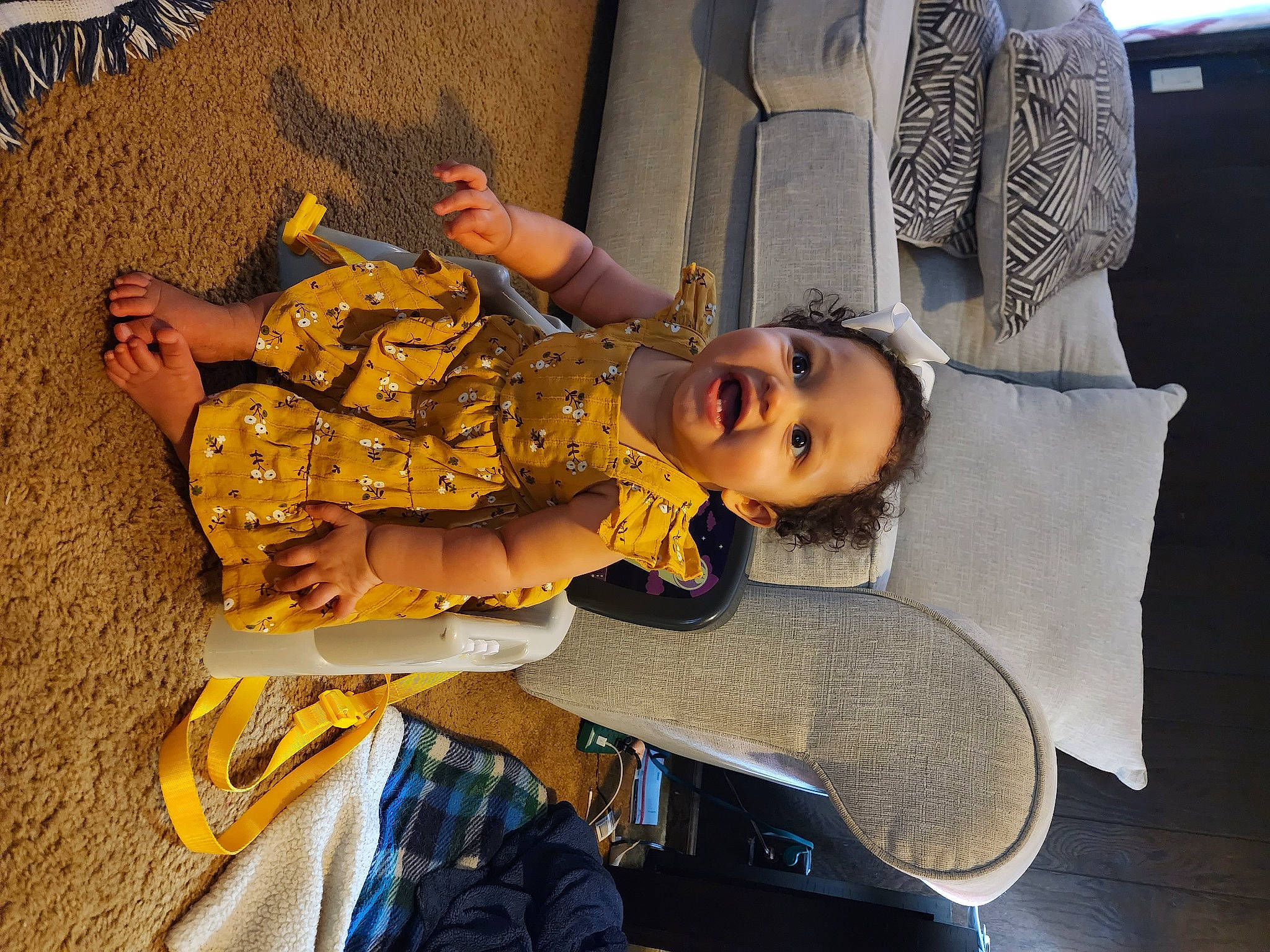 Nevaeh is registered to the contest to win money with this photo: art, child, cool, fun, happy, leisure, person, room, sitting, smile, thigh, toddler, tourism, travel, vacation, visual_arts, world