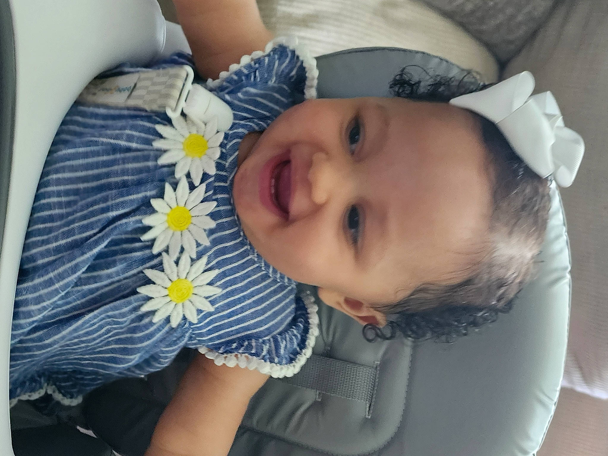 Nevaeh joined the competition — help win amazing prizes! baby_toddler_clothing, cheek, dress, eye, eyelash, facial_expression, flower, hairstyle, happy, head, iris, lip, mouth, nose, organ, person, plant, skin, smile, white