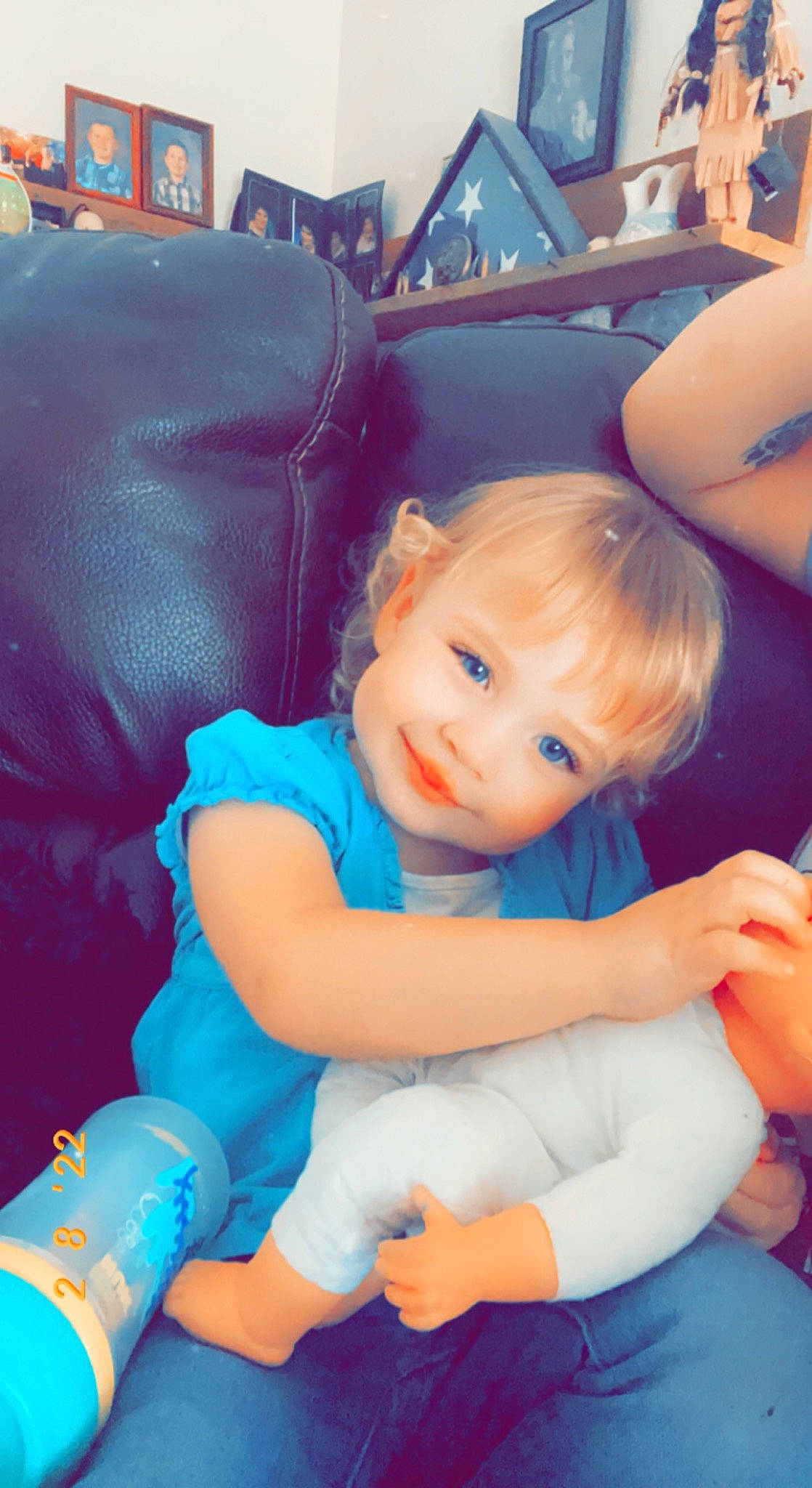 Leanna joined the competition — help win amazing prizes! azure, baby_toddler_clothing, blue, blurred, child, electric_blue, finger, fun, gesture, grass, happy, iris, joy, lap, leisure, person, purple, recreation, sitting, skin