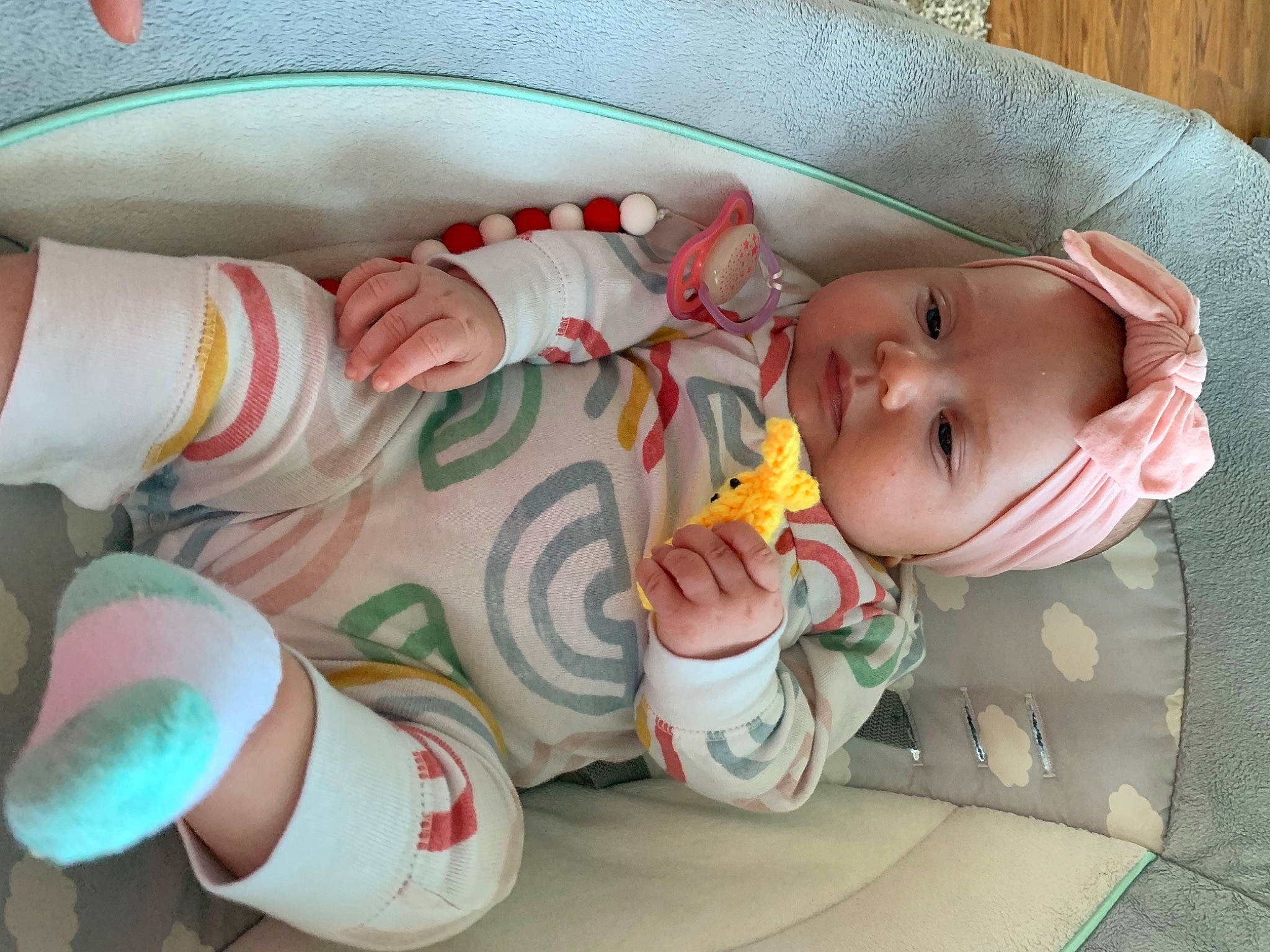 Camille is registered to the contest to win money with this photo: arm, baby, baby_carriage, baby_products, baby_safety, baby_sleeping, baby_toddler_clothing, cheek, child, comfort, eye, hand, head, headwear, human_body, leg, linens, mouth, person, skin