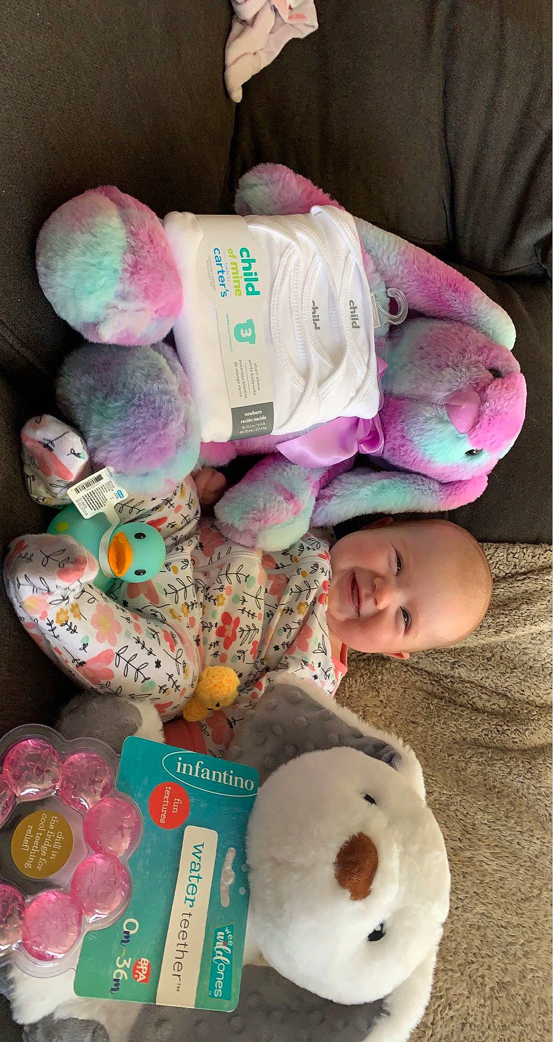 Camille is registered to the contest to win money with this photo: baby, baby_products, baby_toddler_clothing, baby_toys, cheek, child, event, headgear, joy, magenta, person, pink, plush, product, room, snapshot, stuffed_toy, sweetness, textile, toddler