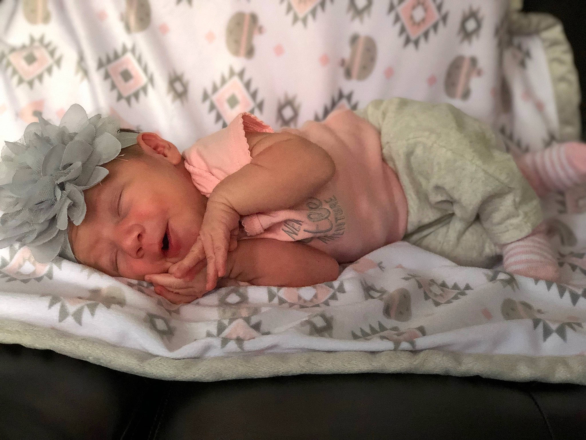 Mylah joined the competition — help win amazing prizes! arm, baby, baby_products, baby_sleeping, baby_toddler_clothing, bedding, bedtime, child, comfort, finger, hand, headgear, headwear, human_body, linens, pattern, person, pink, room, skin