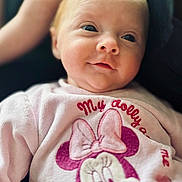 Kléa participe au concours pour gagner de l'argent avec cette photo : baby, infant, smiling, face, pink_sweater, minnie_mouse, clothing, cute, portrait, child, soft_lighting, closeup, young_child, happy, indoor, person, sitting, apparel, baby_girl, doll