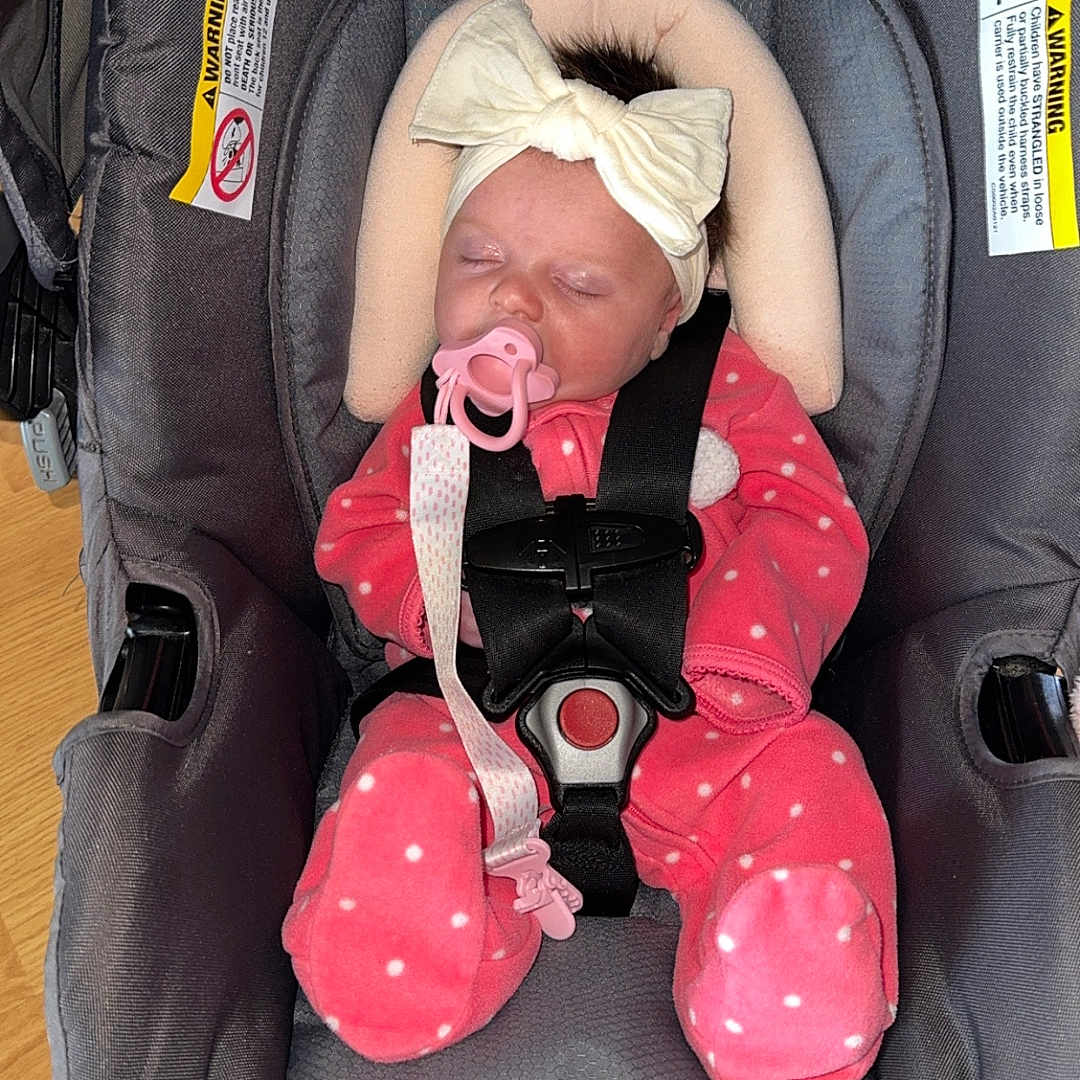 Eliana Grace joined the competition — help win amazing prizes! accessories, baby, car, car_interior, carseat, clothing, cushion, face, furniture, glove, hat, head, homedecor, person, photography, portrait, sleeping, sunglasses, transportation, vehicle