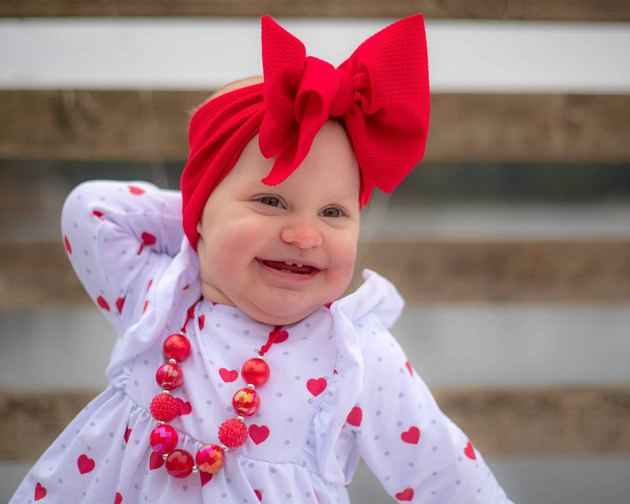 Jaelyn joined the competition — help win amazing prizes! baby, child, clothing, costume, costume_accessory, design, ear, fashion_accessory, hair_accessory, hat, head, headgear, joy, lip, organ, outerwear, pattern, person, pink, red
