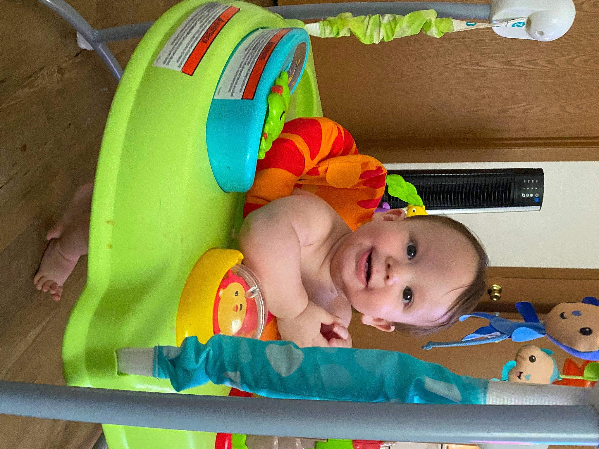Bradley is registered to the contest to win money with this photo: baby, baby_playing_with_toys, baby_products, baby_safety, baby_toddler_clothing, baby_toys, bed, bedtime, cheek, child, cradle, flooring, fun, green, happy, infant_bed, joy, leisure, person, room