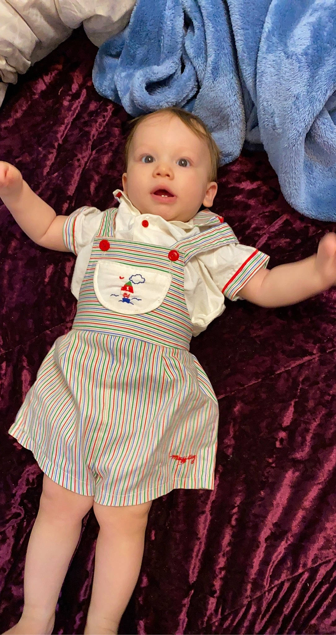 Bradley joined the competition — help win amazing prizes! baby, baby_toddler_clothing, cheek, child, day_dress, face, finger, flash_photography, gesture, hand, happy, head, lip, one_piece_garment, person, pink, red, skin, sleeve, standing