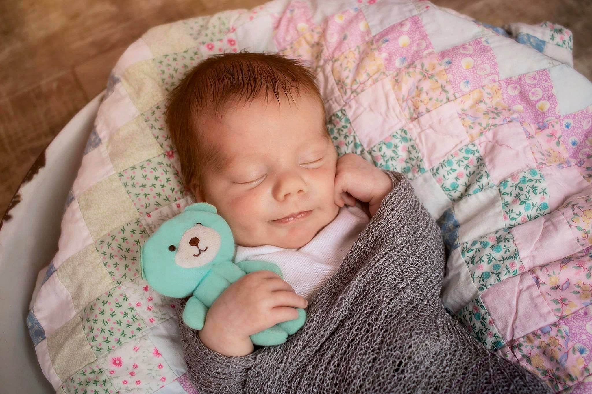 Remington joined the competition — help win amazing prizes! baby, baby_sleeping, baby_toddler_clothing, cheek, child, chin, comfort, eye, face, finger, grass, head, headgear, iris, linens, nose, person, pink, skin, textile