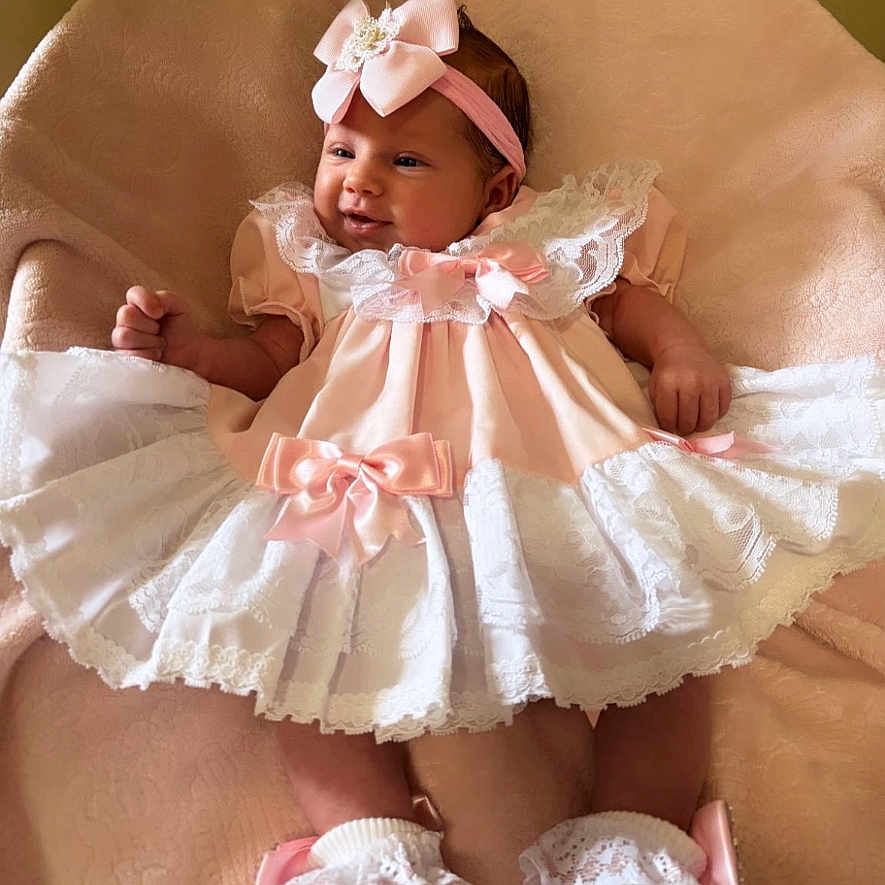 Maryanna Maria joined the competition — help win amazing prizes! baby, bed, bodypart, bonnet, clothing, costume, couch, doll, dress, face, finger, furniture, hand, hat, head, newborn, person, photography, portrait, toy