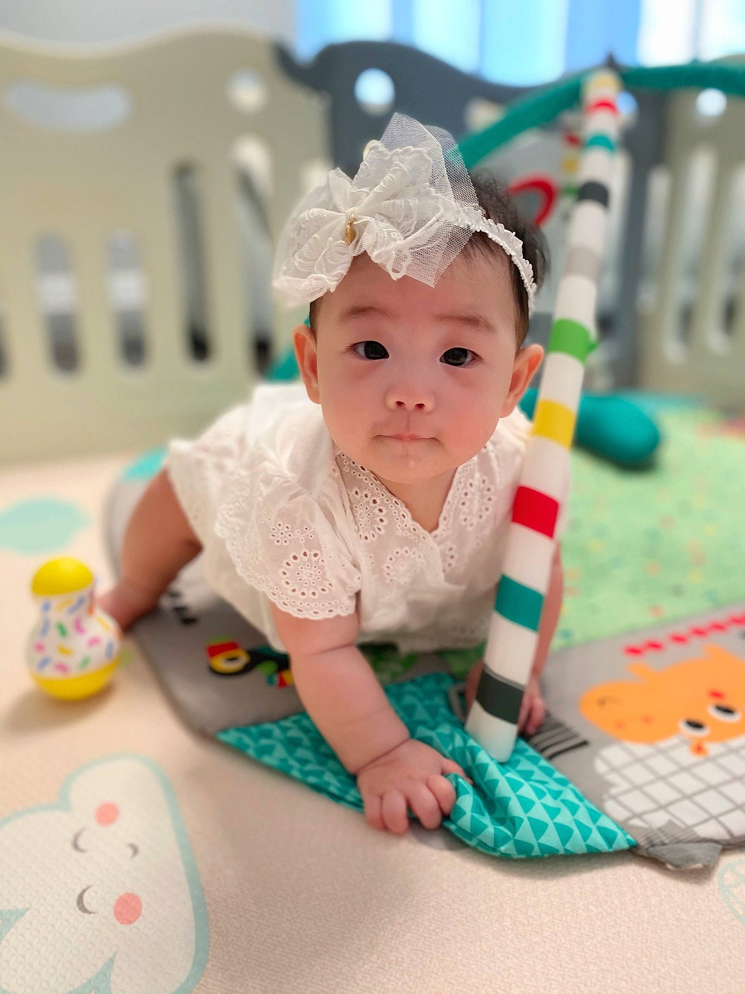 Carina is registered to the contest to win money with this photo: baby, baby_toddler_clothing, child, design, ear, hair_accessory, headgear, headpiece, headwear, pattern, person, play, polka_dot, product, room, toddler