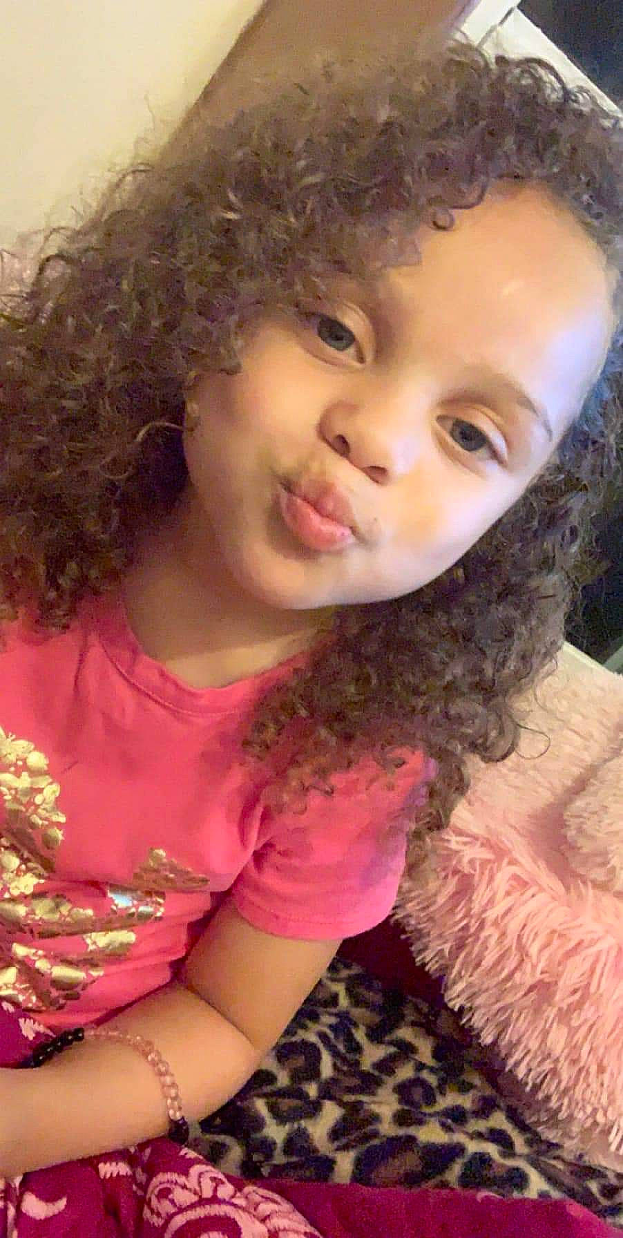Ma'Riyah is registered to the contest to win money with this photo: beauty, brown_hair, cheek, child, chin, eye, eyebrow, face, forehead, hair, hairstyle, head, human, jheri_curl, lip, nose, person, pink, ringlet, skin