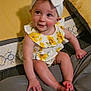 Ariella is registered to the contest to win money with this photo: baby, child, headband, bow, flower_pattern, yellow, bed, pillow, blanket, smiling, infant, cute, indoors, person, sitting, playful, skin, face, hand, foot