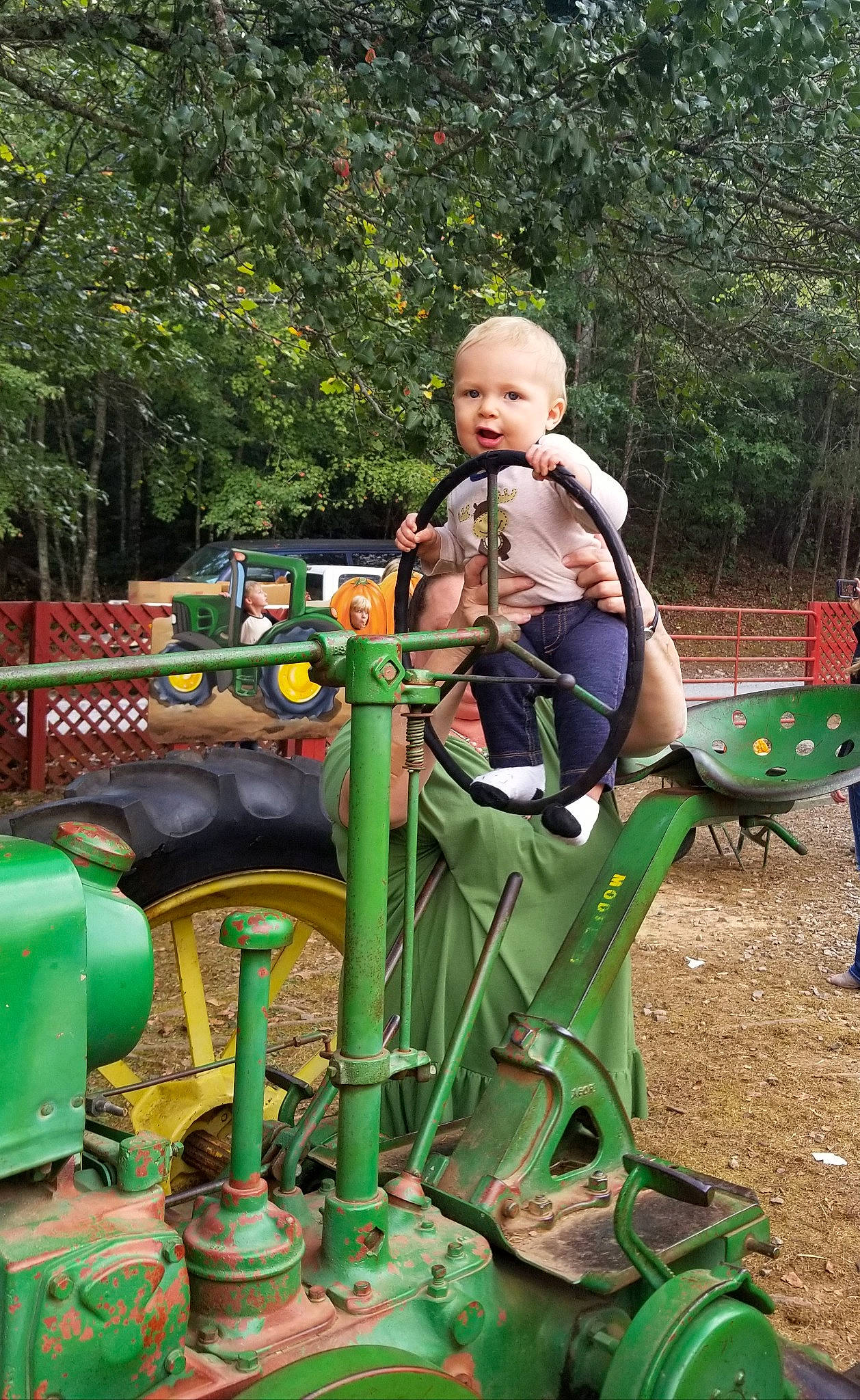 Connor is registered to the contest to win money with this photo: child, fun, green, person, playground, public_space, recreation, vehicle
