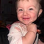 Athena is registered to the contest to win money with this photo: toddler, child, smiling, face, pajamas, indoor, cute, happy, baby, person, portrait, skin, hand, hair, eyes, infant, holding, cozy, expression, light