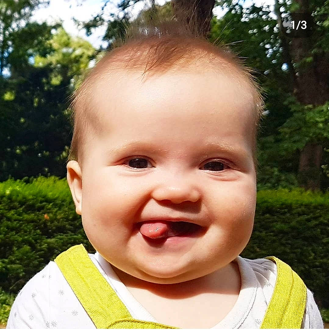 Eloïse participe au concours pour gagner de l'argent avec cette photo : baby, baby_laughing, baby_toddler_clothing, cheek, child, ear, eyebrow, eyelash, grass, happy, iris, jaw, joy, lip, nose, people_in_nature, person, plant, smile, summer