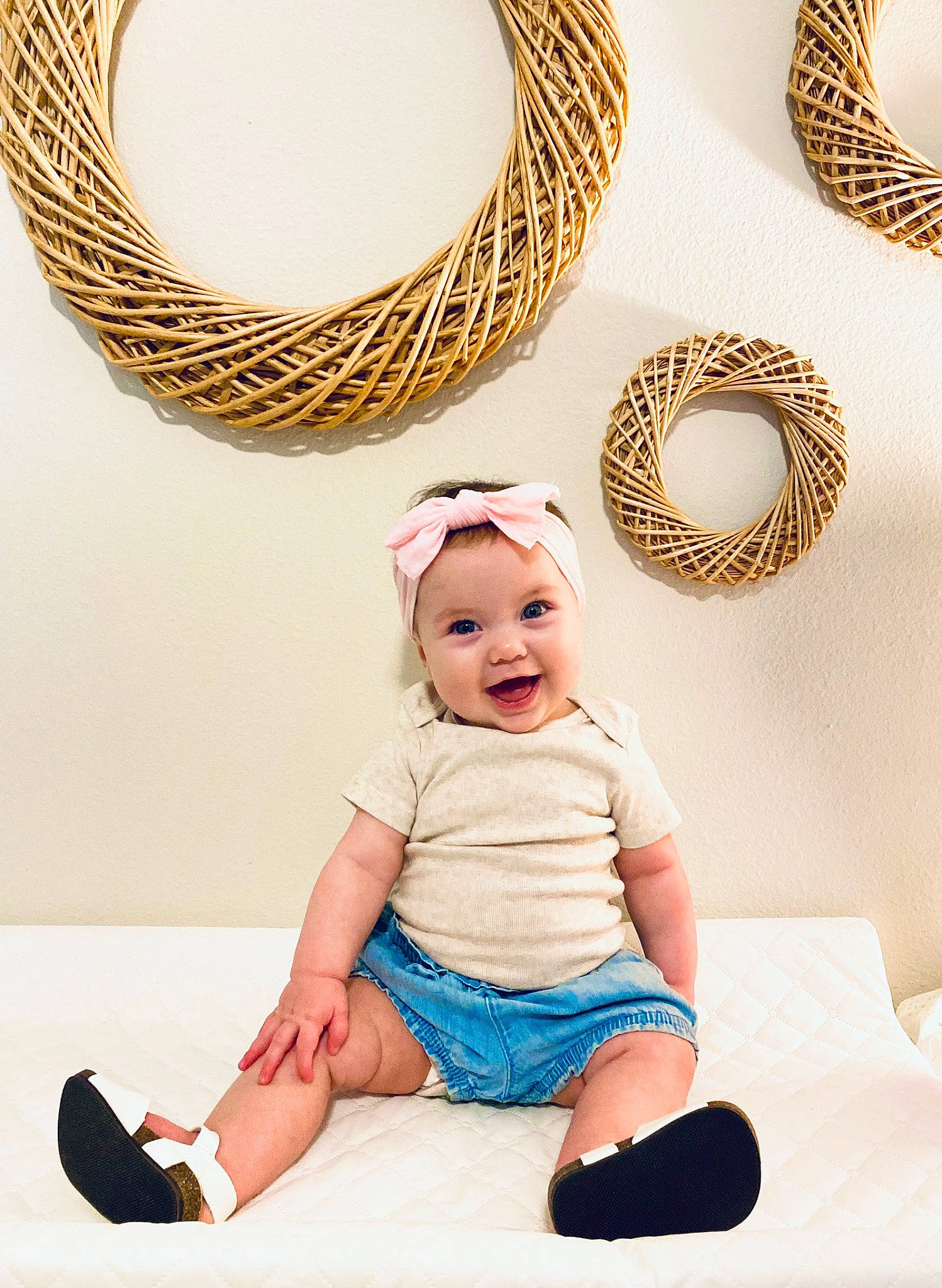 Caroline joined the competition — help win amazing prizes! baby, baby_toddler_clothing, basket, child, comfort, fashion_accessory, happy, hat, headgear, headwear, jewellery, pattern, person, rope, sitting, sleeve, smile, sock, t_shirt, toddler