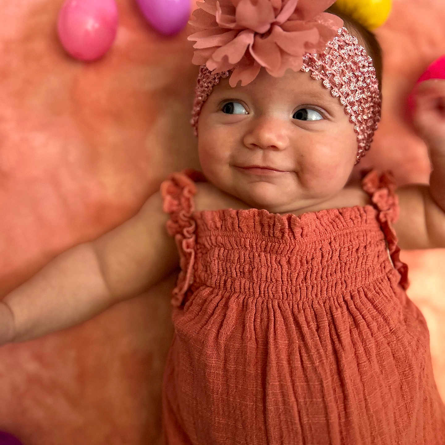 Nova is registered to the contest to win money with this photo: accessories, baby, bodypart, cap, clothing, dress, face, finger, food, hand, happy, hat, head, newborn, person, photography, portrait, purple, smile, sphere