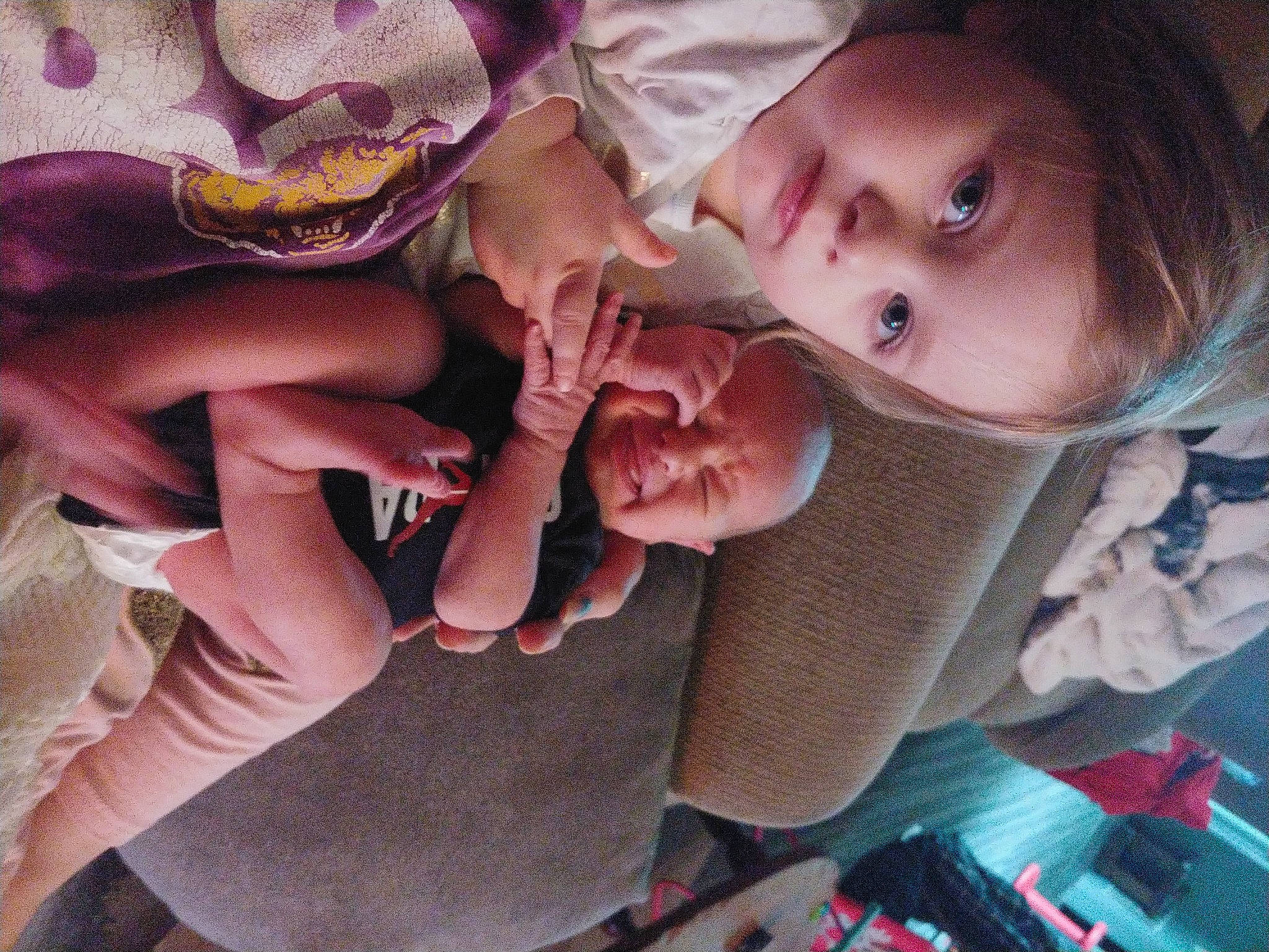 Savanna is registered to the contest to win money with this photo: arm, baby, cheek, comfort, eye, eyelash, facial_expression, finger, gesture, hand, happy, head, interaction, iris, lip, mouth, nail, person, pink, skin