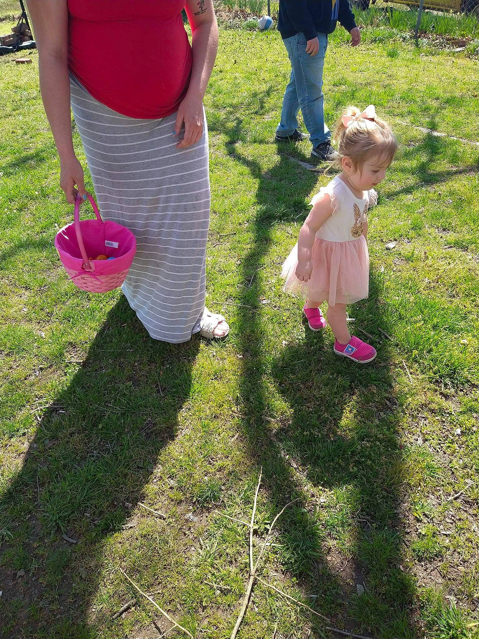 Savanna joined the competition — help win amazing prizes! baby_toddler_clothing, bag, boot, calf, child, fun, gesture, grass, grassland, human_leg, lawn, luggage_and_bags, magenta, meadow, pattern, people_in_nature, person, pink, recreation, toddler