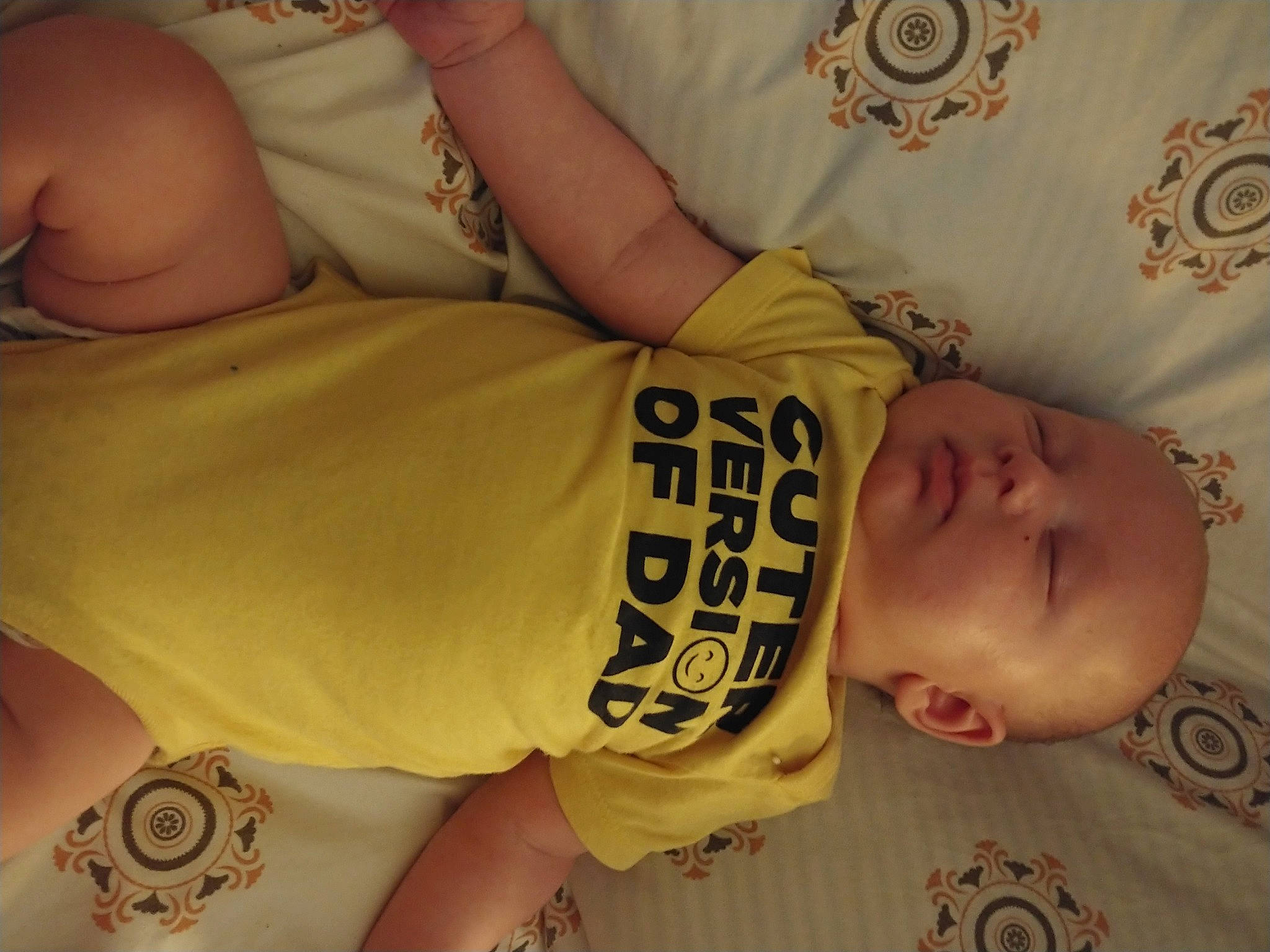 Christopher is registered to the contest to win money with this photo: arm, baby_toddler_clothing, cheek, comfort, cool, facial_expression, finger, gesture, hairstyle, happy, human_body, mouth, muscle, neck, nose, person, product, skin, sleeve, textile