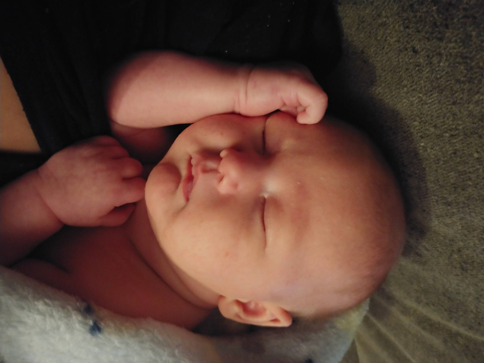 Christopher is registered to the contest to win money with this photo: arm, baby, cheek, chin, comfort, ear, eye, eyelash, finger, gesture, hand, iris, lip, mouth, nail, neck, nose, person, skin, thumb