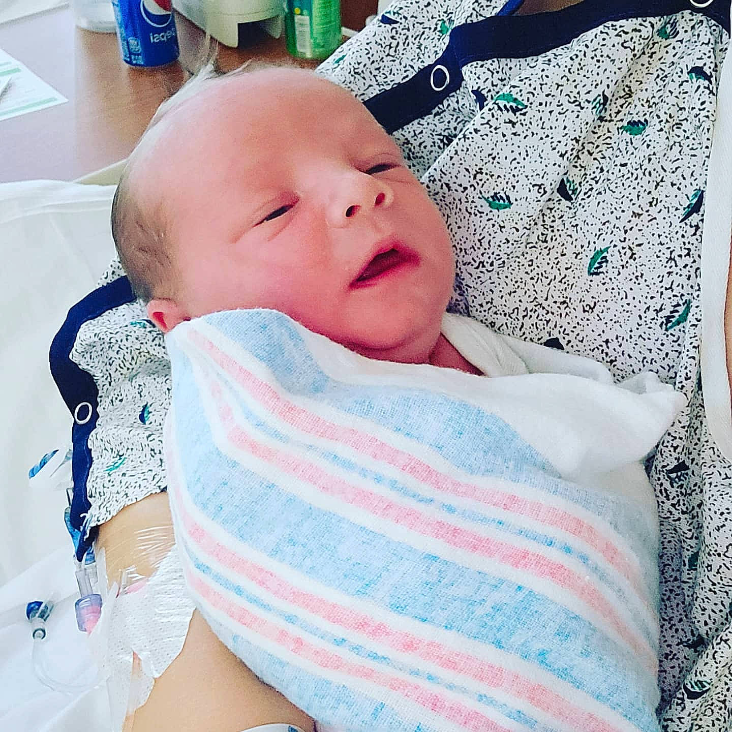 Hagen is registered to the contest to win money with this photo: aqua, azure, baby, baby_products, baby_safety, baby_sleeping, baby_toddler_clothing, bedding, bedtime, cheek, child, comfort, happy, linens, pattern, person, sleeve, t_shirt, textile, toddler