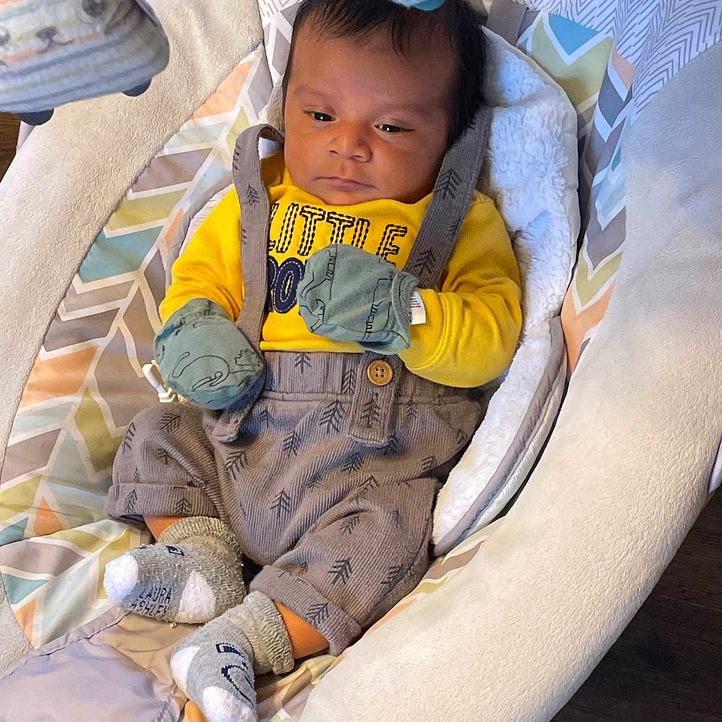 Ivan is registered to the contest to win money with this photo: baby, bed, blanket, clothing, crib, cushion, face, furniture, glove, happy, hat, head, homedecor, hosiery, infantbed, jeans, knitwear, pants, person, photography
