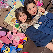 Jabal And Gory is registered to the contest to win money with this photo: child, children, couch, toy, plush_toy, birthday, gift_bag, hug, sibling, cute, indoor, clothing, smile, face, person, celebration, colorful, happy, young, family