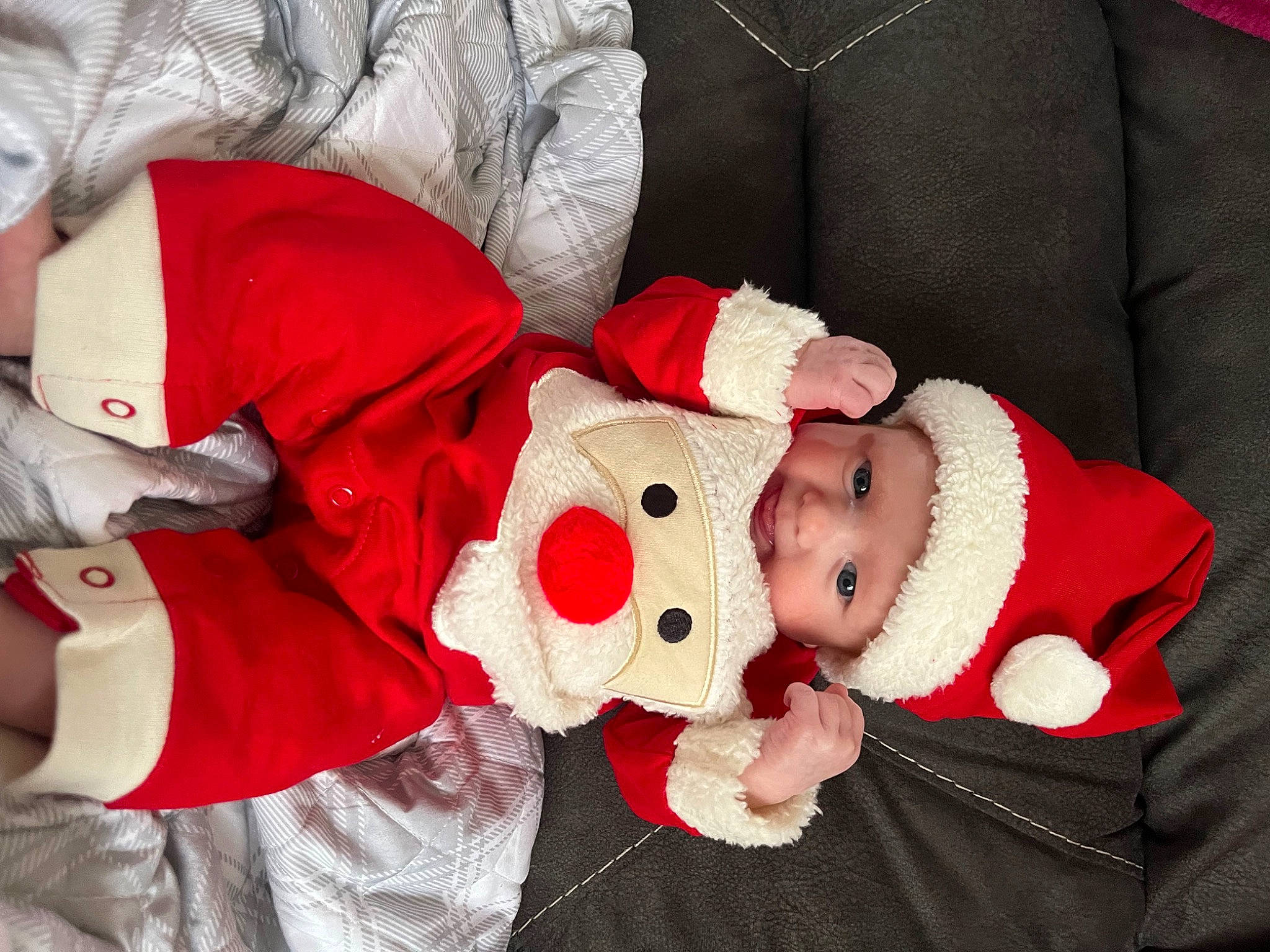 Lainey joined the competition — help win amazing prizes! baby, baby_toddler_clothing, carmine, child, christmas, christmas_eve, comfort, costume, costume_hat, event, fictional_character, fur, hat, headwear, holiday, lap, person, red, santa_claus, sleeve
