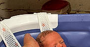 Bryce joined the competition — help win amazing prizes! baby, bath, care, cleaning, closeup, container, hand, indoor, infant, newborn, parent, person, plumbing, relaxing, skin, support, tub, wall, water, wet