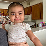 A Lanah joined the competition — help win amazing prizes! toddler, child, smile, indoor, kitchen, clothing, person, face, baby, cabinet, refrigerator, magnet, photo, counter, appliance, shorts, top, cute, home, expression
