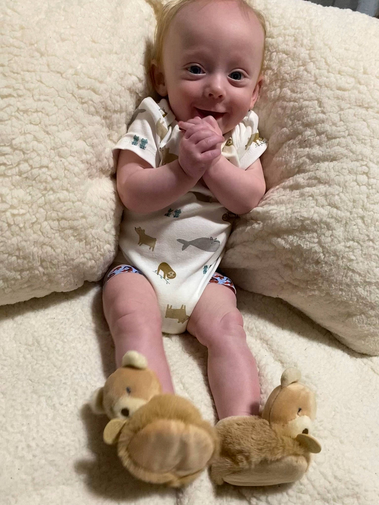 Callan is registered to the contest to win money with this photo: arm, baby, baby_toddler_clothing, cheek, child, comfort, eye, fawn, happy, head, leg, linens, person, photograph, skin, smile, textile, thigh, toddler, toy