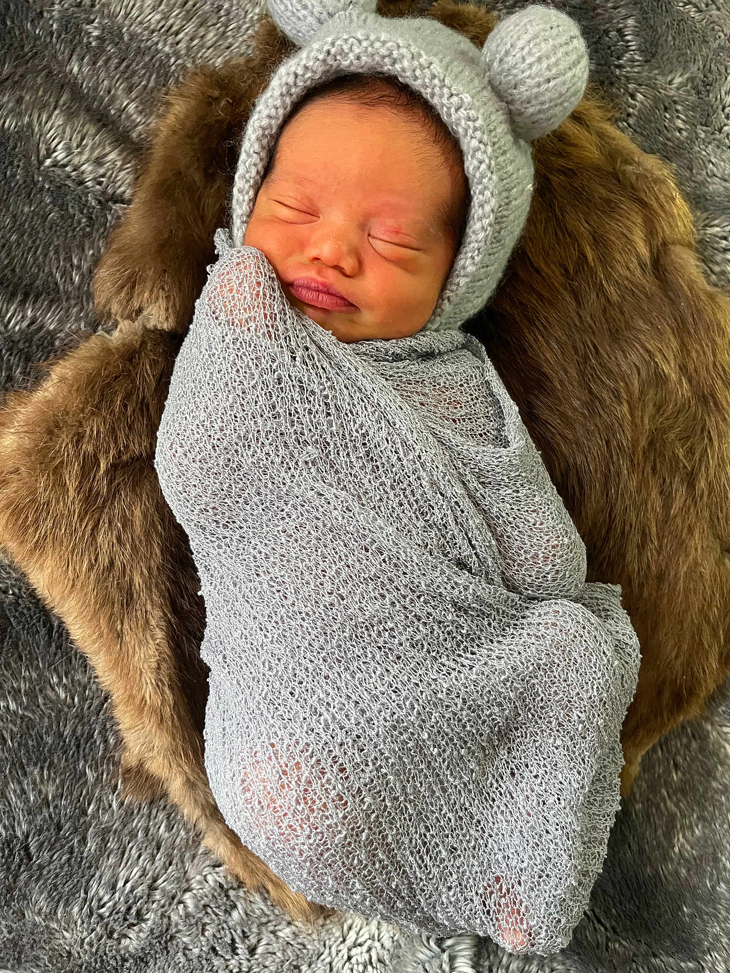 Levi Amiri joined the competition — help win amazing prizes! newborn, baby, sleeping, wrapped, blanket, knitted, hat, bear_ears, fur, cushion, cozy, soft, cute, infant, portrait, peaceful, resting, indoors, child, small