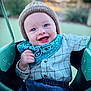 Asher joined the competition — help win amazing prizes! baby, child, smile, blue_eyes, knit_hat, bandana, swing, outdoor, happy, cute, portrait, clothing, infant, face, cheerful, playground, baby_clothes, baby_girl, baby_boy, childhood