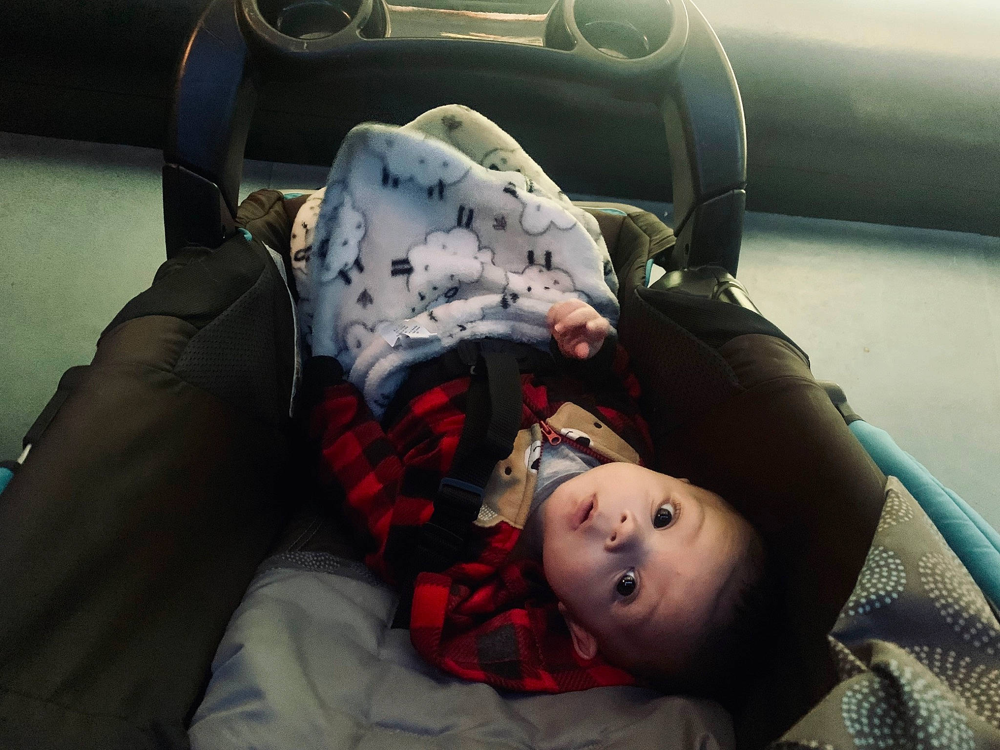 Joel is registered to the contest to win money with this photo: automotive_design, baby, baby_carriage, baby_products, bag, baggage, car_seat, child, comfort, family_car, head_restraint, luggage_and_bags, luxury_vehicle, motor_vehicle, passenger, person, personal_luxury_car, sitting, toddler, travel