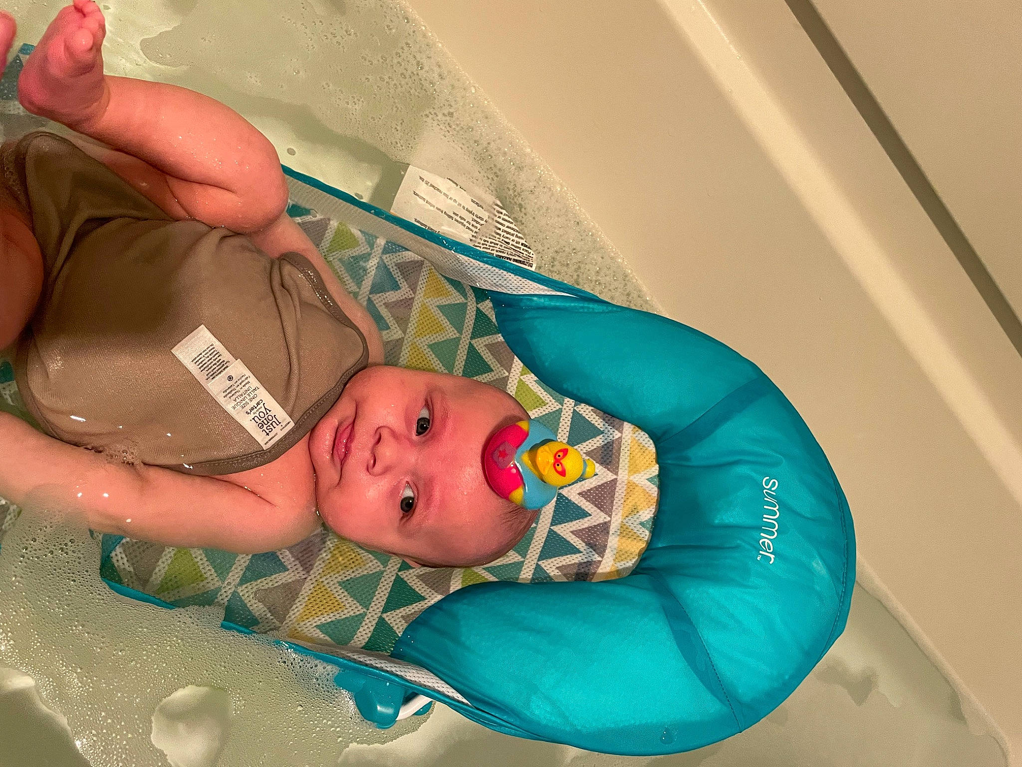 Khai is registered to the contest to win money with this photo: abdomen, baby, baby_products, baby_safety, baby_toddler_clothing, bathing, chest, child, comfort, eye, hat, hospital, leisure, linens, medical_procedure, mouth, pattern, person, plastic, room