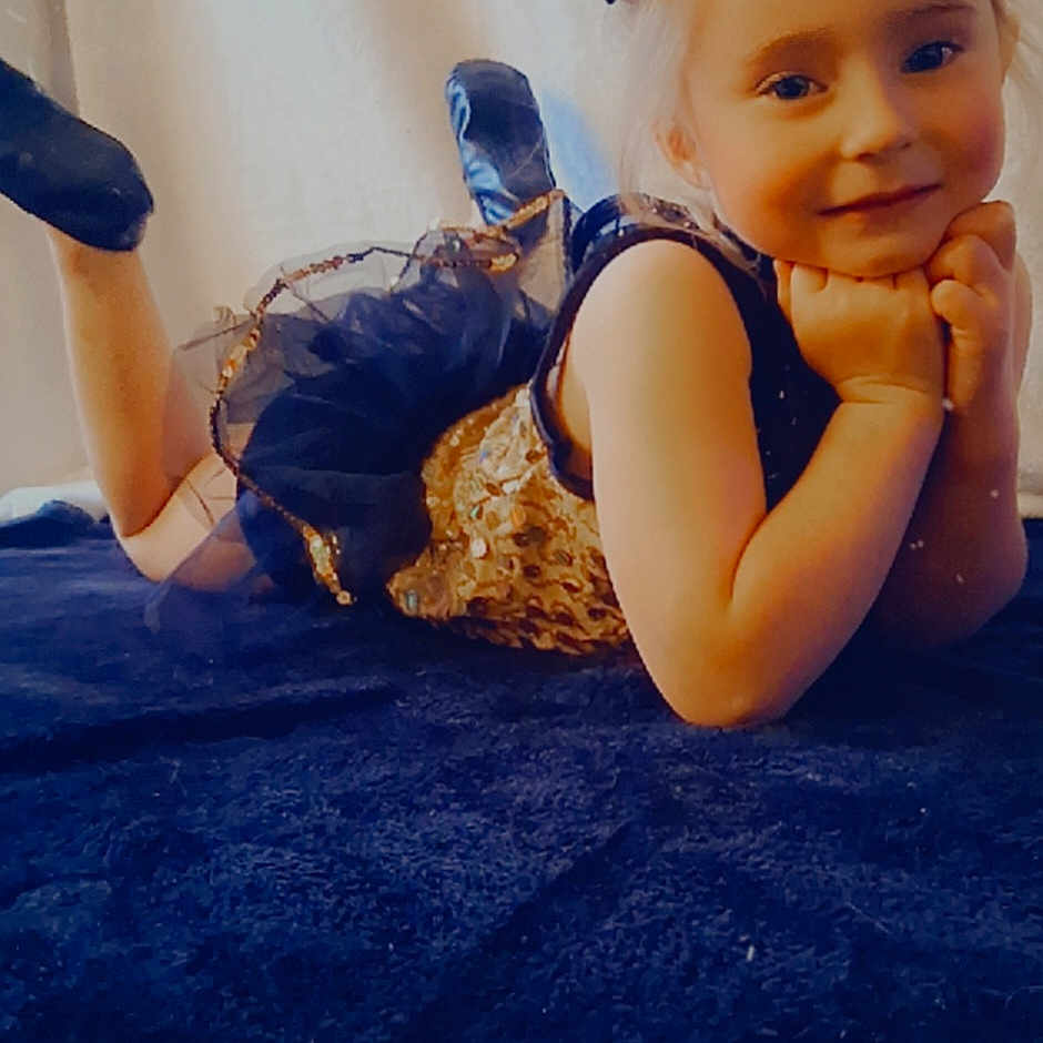 Novalee is registered to the contest to win money with this photo: animal, baby, bodypart, clothing, dress, face, finger, food, formalwear, glove, hand, happy, head, invertebrate, lobster, person, photography, portrait, smile, toy