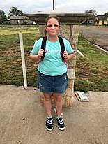 Hannah joined the competition — help win amazing prizes! cloud, denim, electric_blue, fence, fun, grass, grassland, human_leg, joy, landscape, leisure, person, plant, recreation, shorts, sky, sleeve, soil, t_shirt, thigh