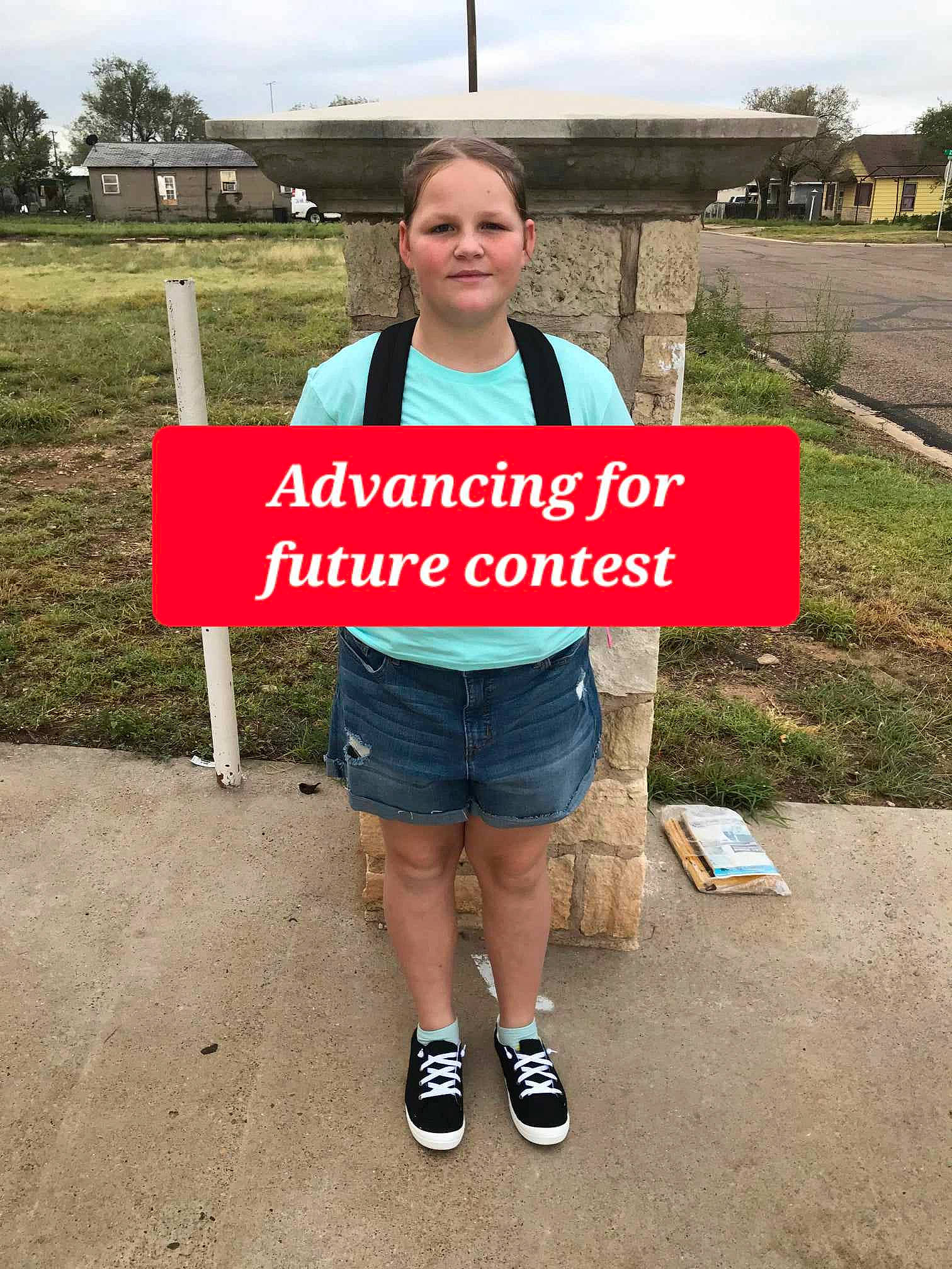 Hannah joined the competition — help win amazing prizes! advertising, asphalt, banner, cloud, font, grass, joy, landscape, logo, person, plant, public_event, recreation, road, road_surface, sign, signage, sky, sleeve, soil