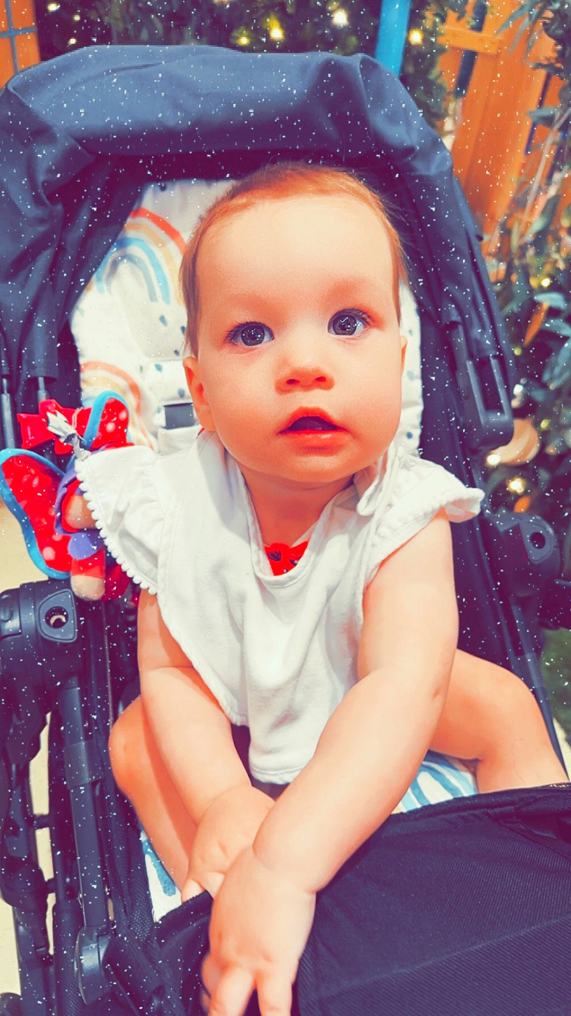 Mackenzie is registered to the contest to win money with this photo: baby, baby_products, baby_toddler_clothing, beanie, cap, cheek, child, eyelash, fashion_accessory, fun, happy, pattern, people, person, portrait_photography, sitting, t_shirt, toddler