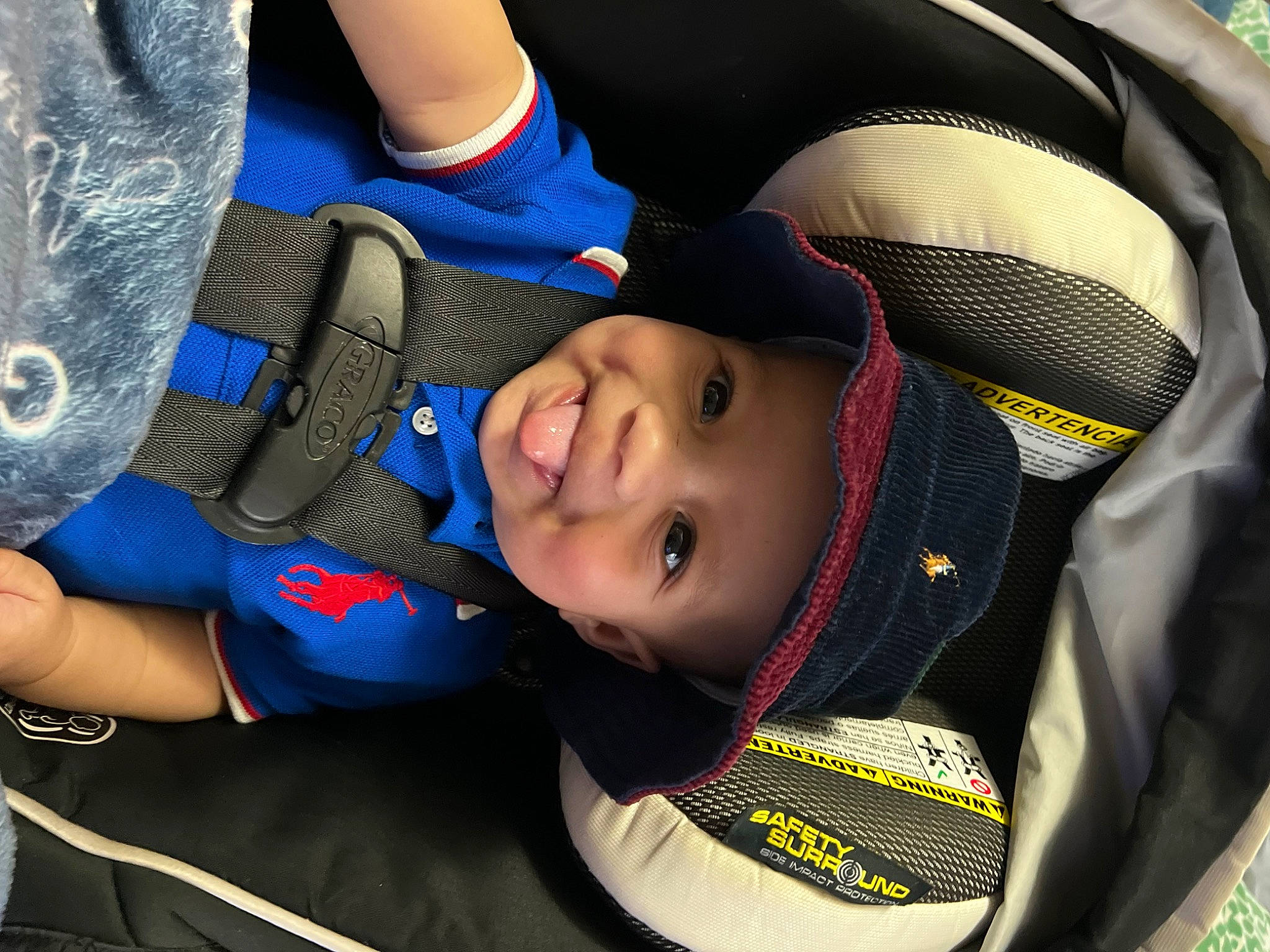 Greyson joined the competition — help win amazing prizes! auto_part, baby, baby_products, car_seat, carmine, child, comfort, elbow, electric_blue, fashion_accessory, fun, gesture, happy, headgear, headwear, joy, nail, person, personal_protective_equipment, smile