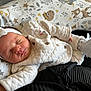 ézya participe au concours pour gagner de l'argent avec cette photo : baby, sleeping, headband, bow, pillow, animal_print, quilted_clothing, booties, infant, peaceful, resting, cute, soft, comfort, indoors, newborn, child, closeup, portrait, blanket
